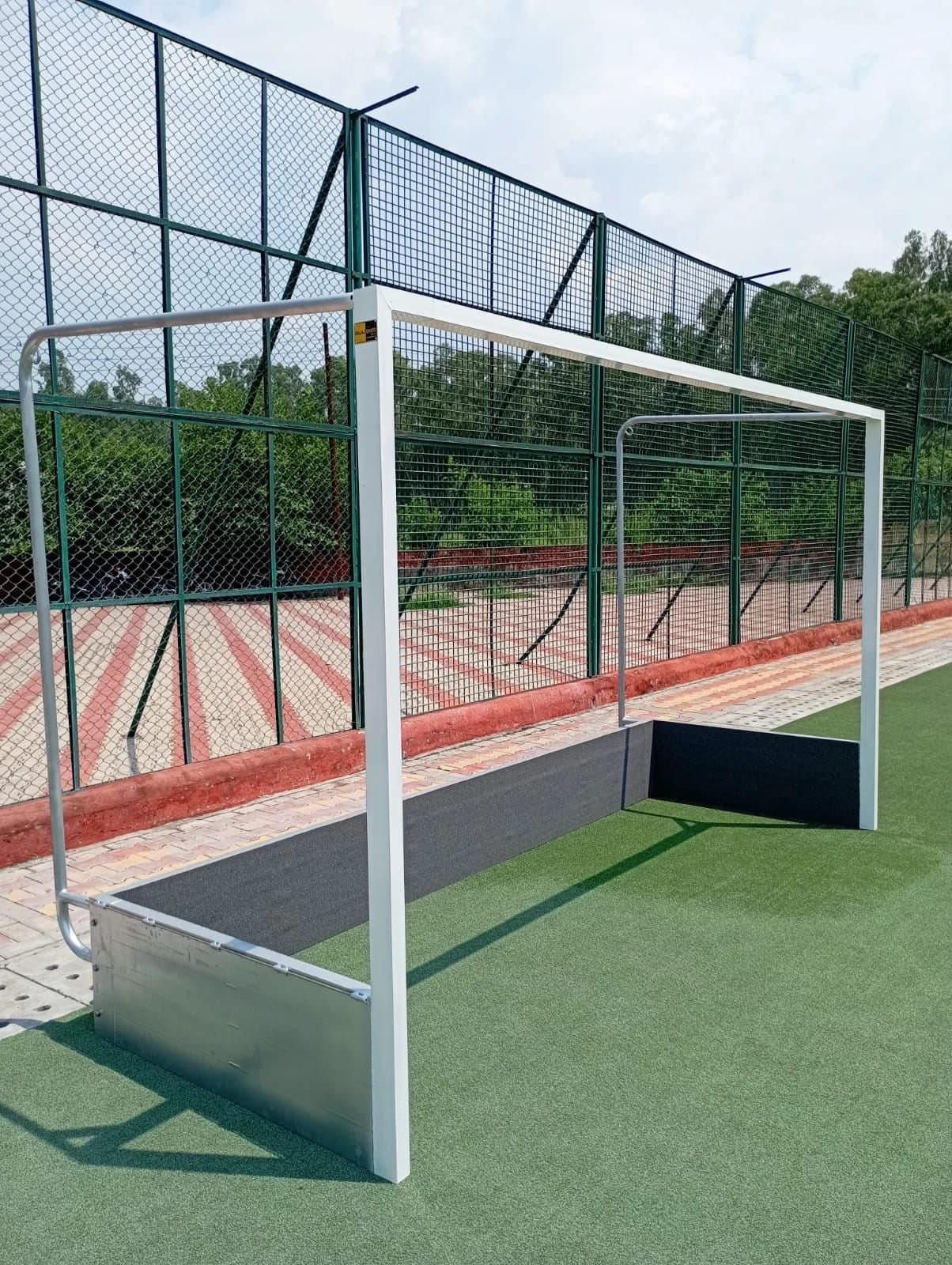 Aluminium goal posts, wrestling mats and turf