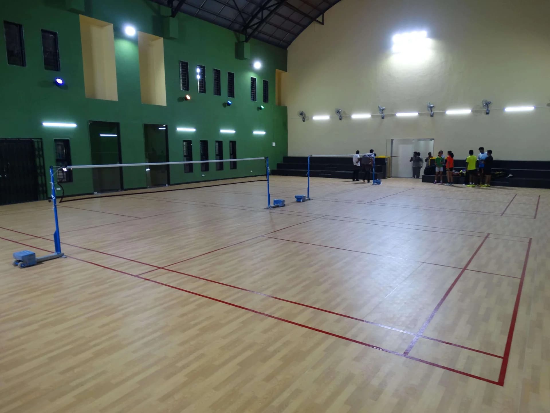 Taraflex Sports M Comfort wood-effect flooring in a badminton hall